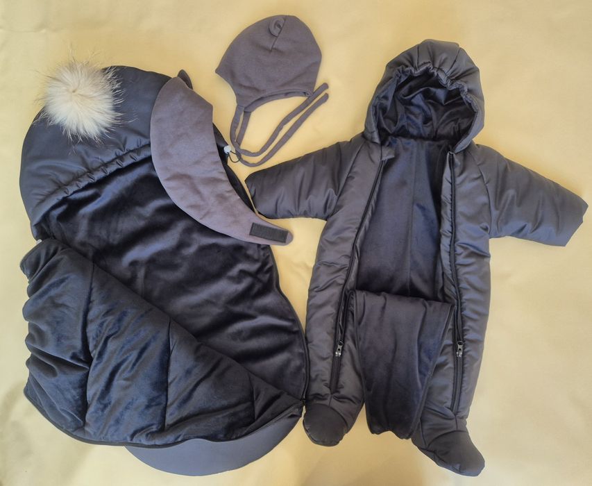 Продам новый комбинезон и конверт