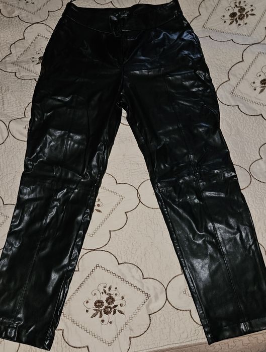 Кожаные брюки 42 размера