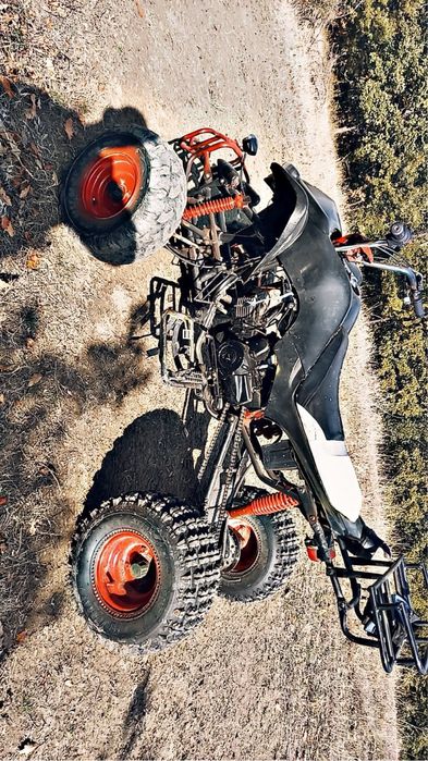 Vand un atv de 125cc