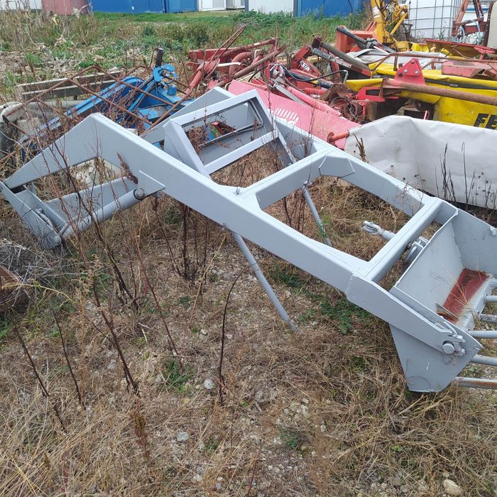 Incarcator frontal cu suport de prindere