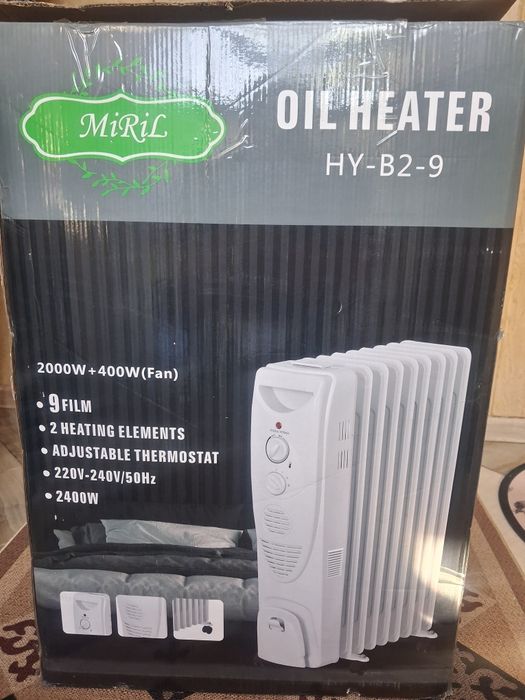 Масляный радиатор MiRiL HY-B2-9 белого цвета.