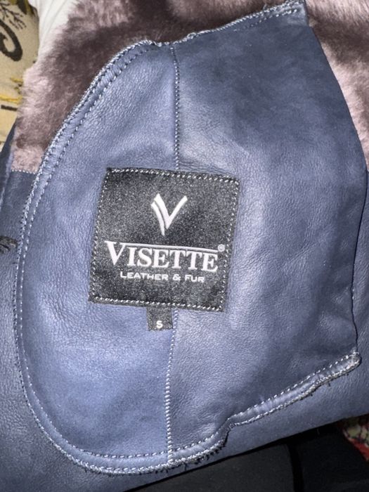 женские куртки и пуховики