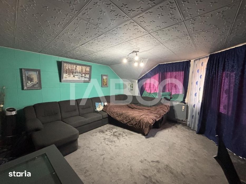Casa individuala cu 5 camere +spatiu comercial  3 bai Sibiu
