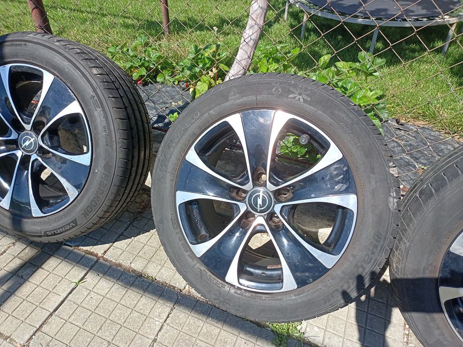 Продавам 4 алуминиеви  джанти 7.5j x 16+4 гуми 205/55 + 4 датчици за налягане+два фланеца за задни джанти 420 евро