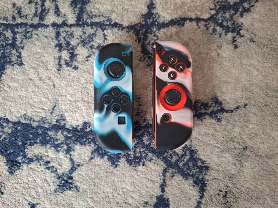 nintendo switch + the witcher 3 + set joy con uri