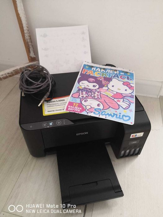 Epson L3200: заправлен и готов к работе