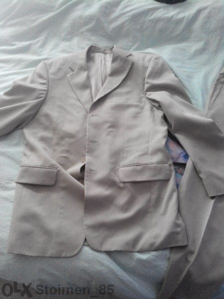 Продавам нов костюм