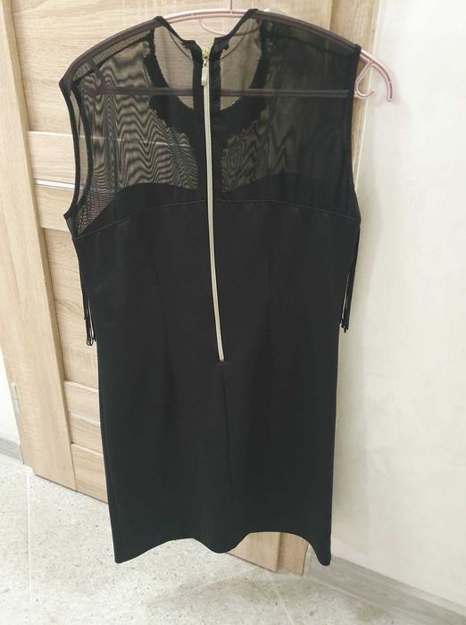 Елегантна дамска черна рокля с ресни