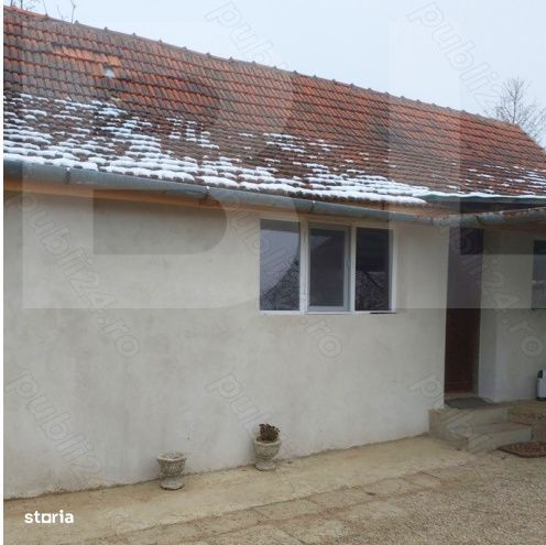 Casa de vanzare intr-o zona linistita, sus pe deal, cu priveliste supe