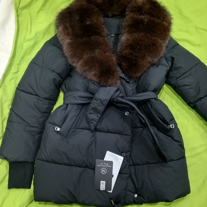 Продам зимний пуховик
