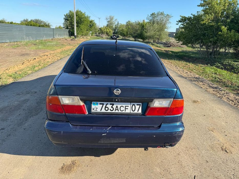 Ниссан примера п11