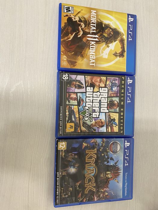 Диски на PS4: GTA PE, MK11, Knack