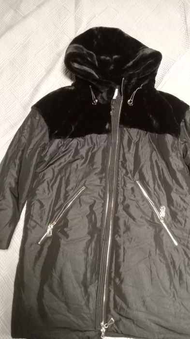 Новый пуховик 50 р