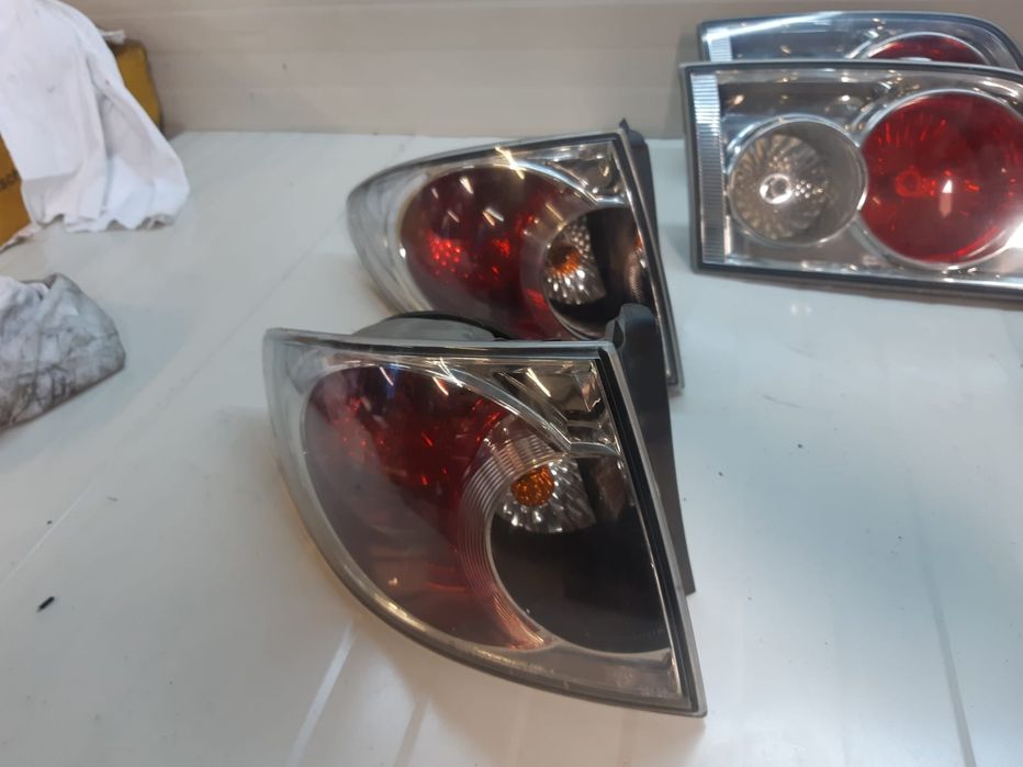 Stop tripla spate Mazda 50lei buc