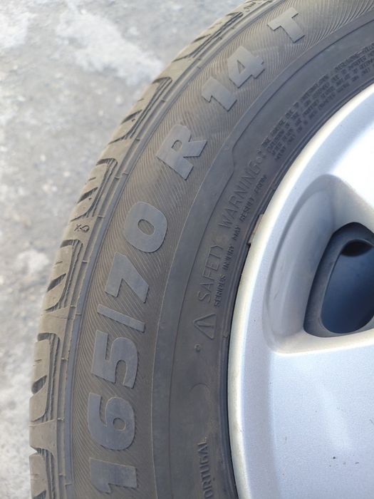 VW Polo  5×100-14" Жл.джанти с гуми+тасове