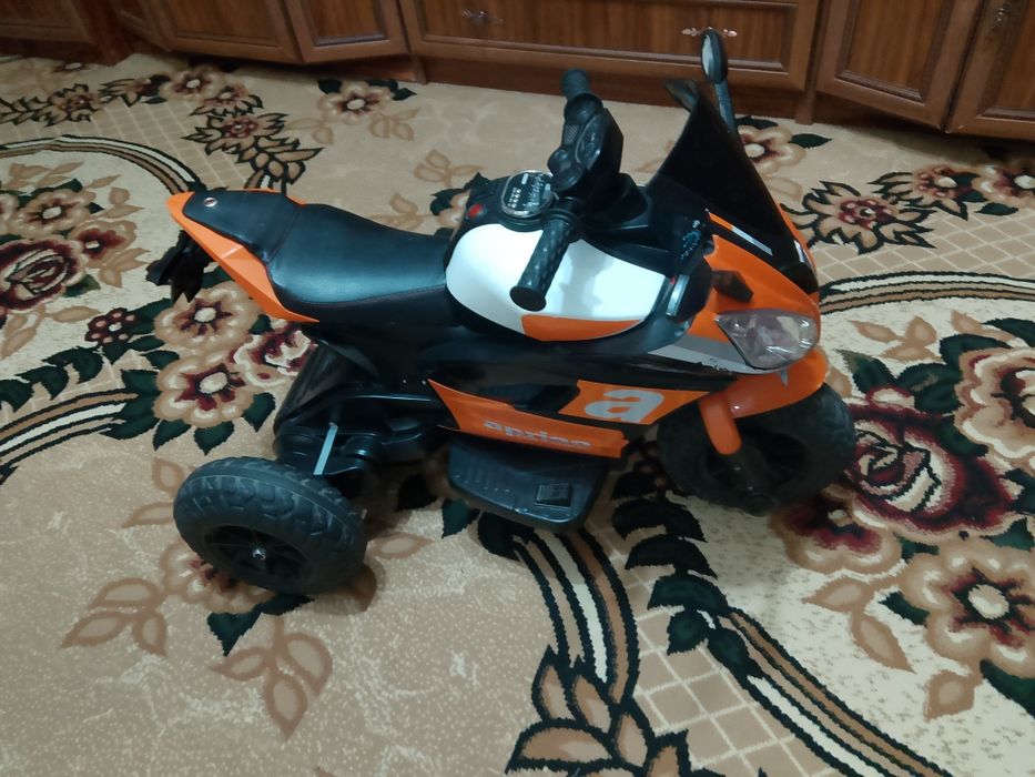 Трёхколёсный мотоцикл для ребенка