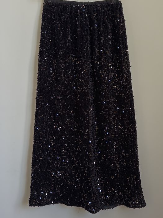 Жылтыр кара юбка