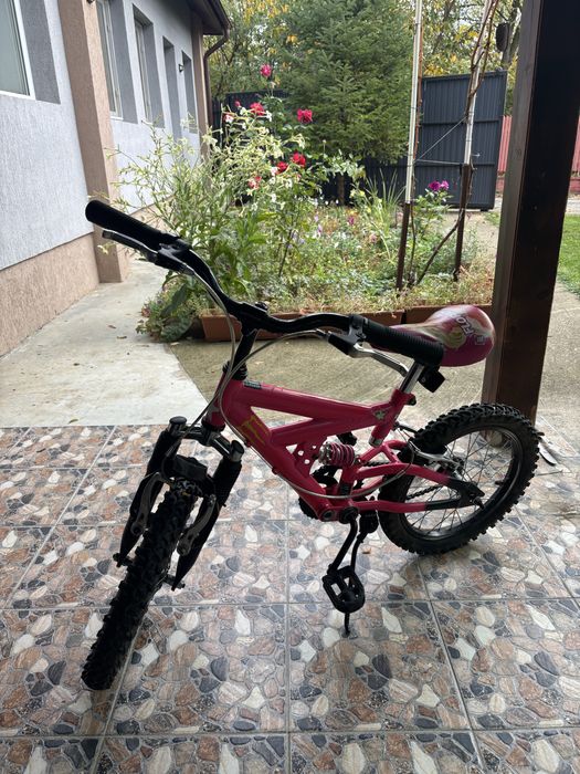 Bicicleta fete cu suspensii fata spate