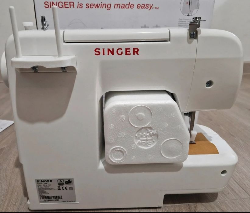 Mașina de cusut singer 1306