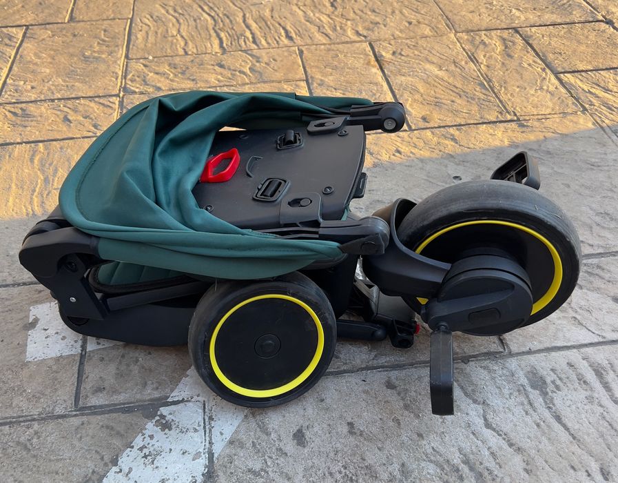 Tricicletă multifuncțională pentru copii , verde, ca și nouă