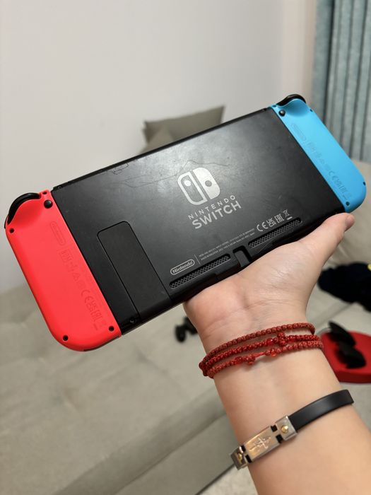 Nintendo SWITCH cu 3 jocuri,volan si husa