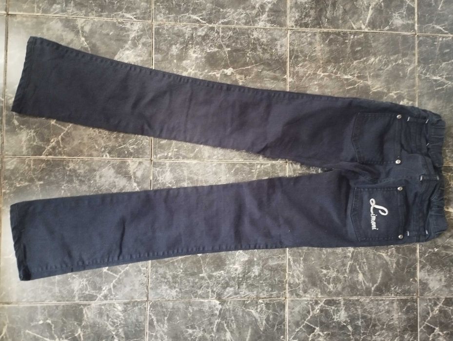 Джинсы девочке 9-11 лет.