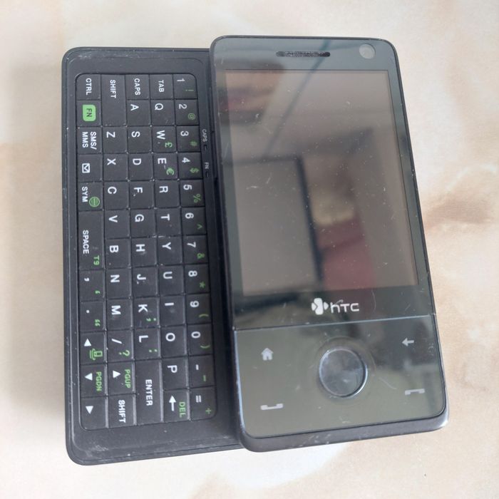 Vând HTC Touch Pro [orange] [nu mai pornește] //poze reale