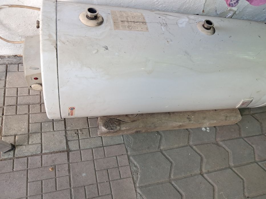 Vând  centrala viadrus cocx și lemne