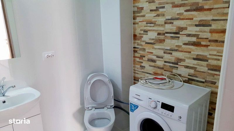 Apartament cu doua dormitoare, parcare proprie, mobilat si utliat