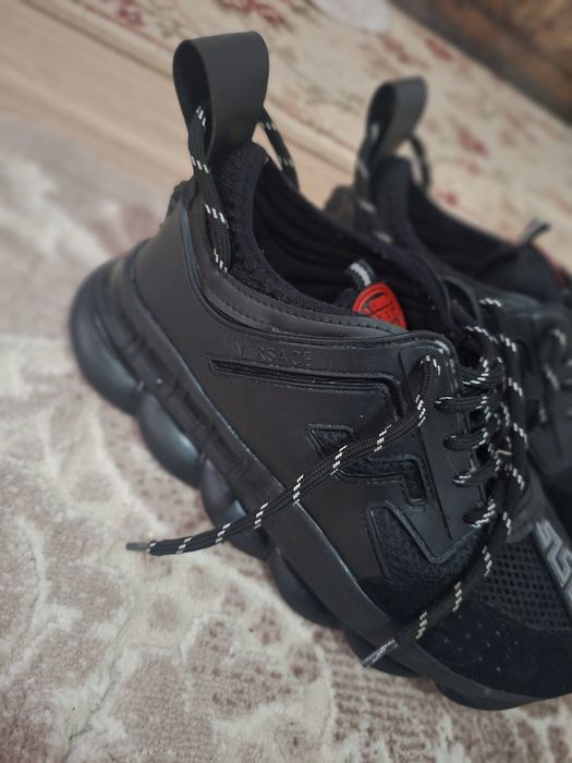 Versace chain reaction