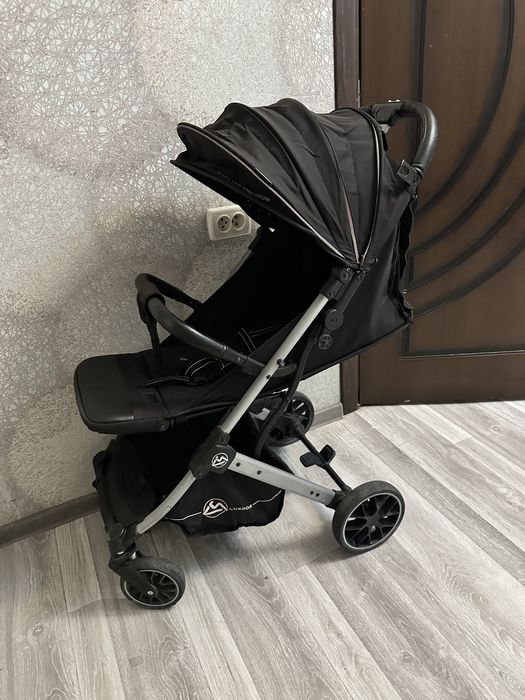 Продам прогулочную коляску Luxmom