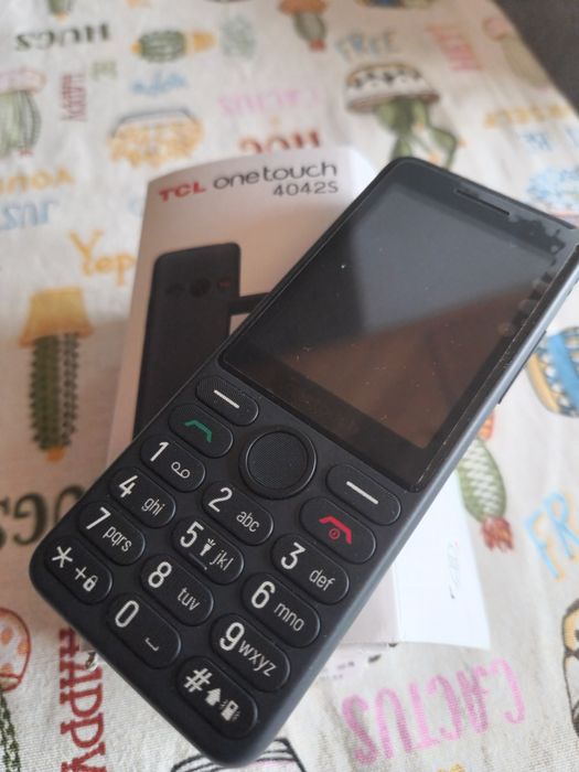 Мобилен телефон TCL