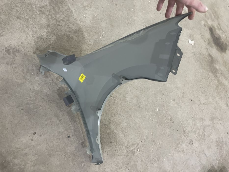 Skoda rapid крыло левое