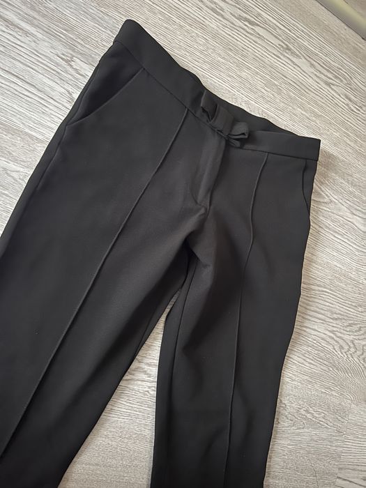 Pantaloni eleganti conici