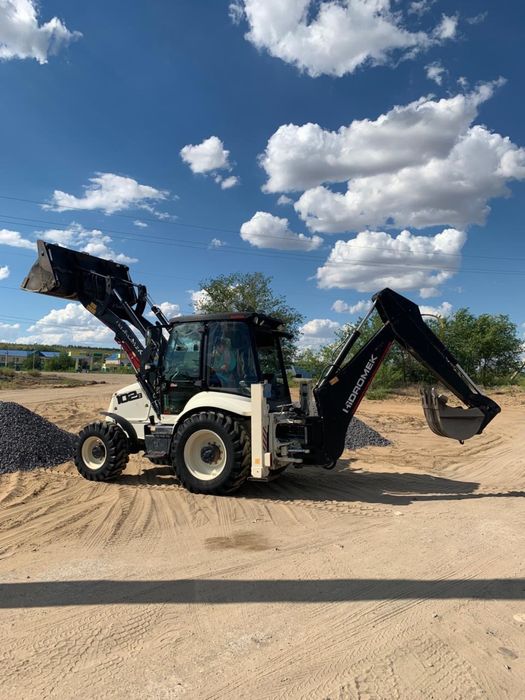 Услуга экскаватора погрузчика