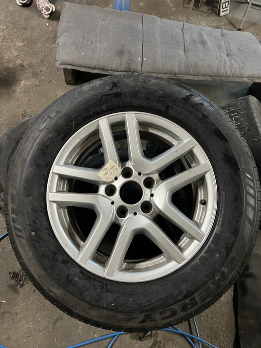 rezerva janta noua pt bmw cu anvelopa 235 65 17 sau de tabla pe 15"