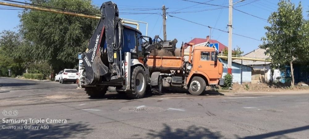 Услуги экскаватора погрузчика