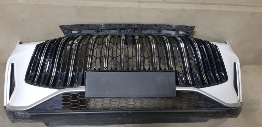 Бампер и решётка от Jetour x50.