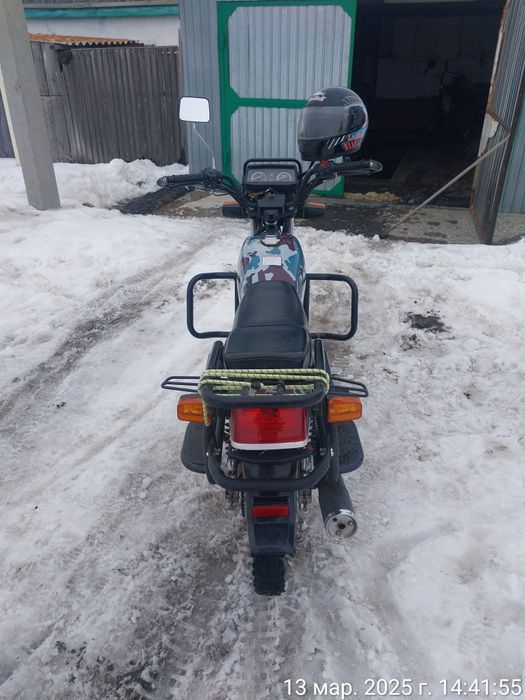 Мотоцикл раисер.