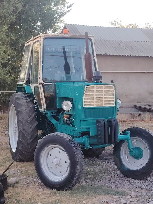 Трактор ЮМЗ с пресс подборшиком