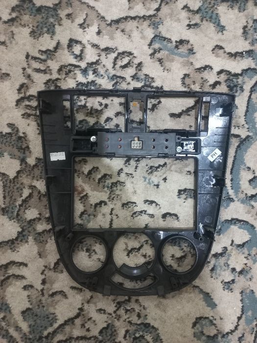 Jentra 2024 ramka va soat va magnitola