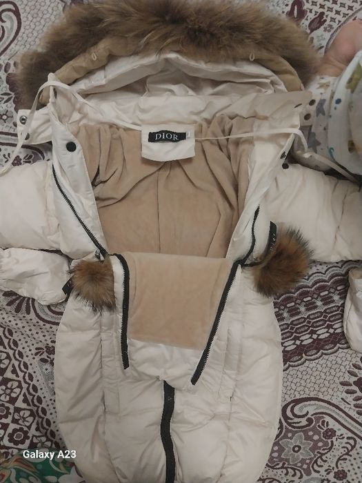 Продаю зимний комбинезон трансформер