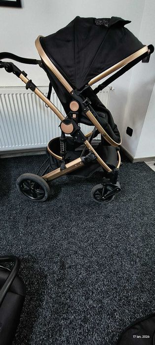 Vand carucior reversibil, suspensii, cu landou si scoica aproape nou