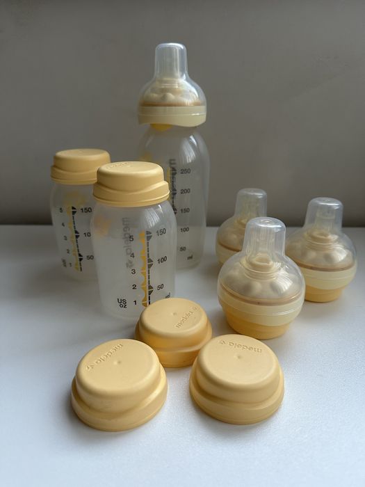 Електрическа помпа за кърма Medela Swing с бутилки и аксесоари