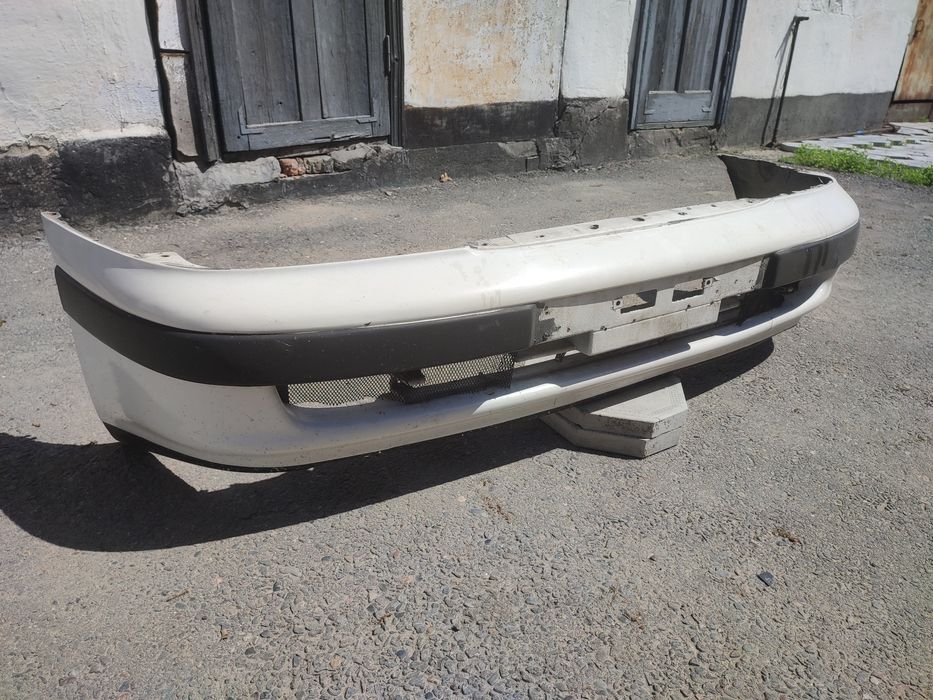 Продам Бампер тойота карина е