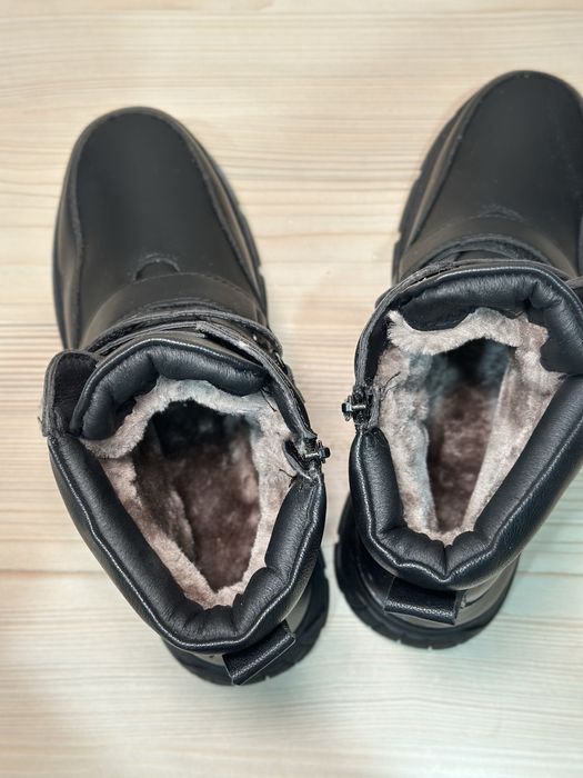 Продам новые зимние ботинки