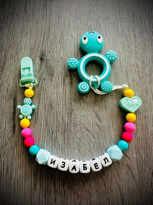 Клипс за биберон с гризалка