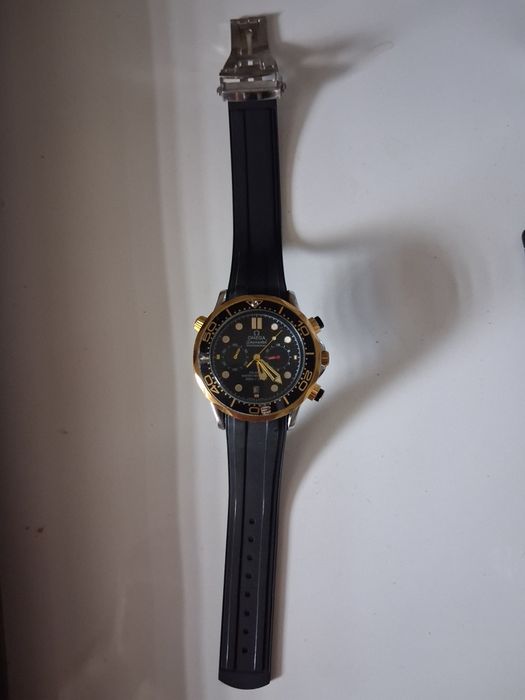Ceas quart Sector și Omega automatic