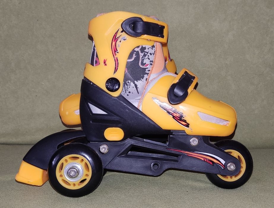 Роликовые коньки