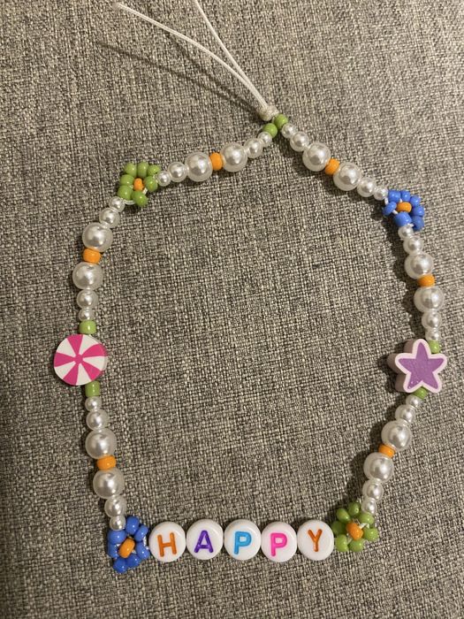 Гривна Happy.
